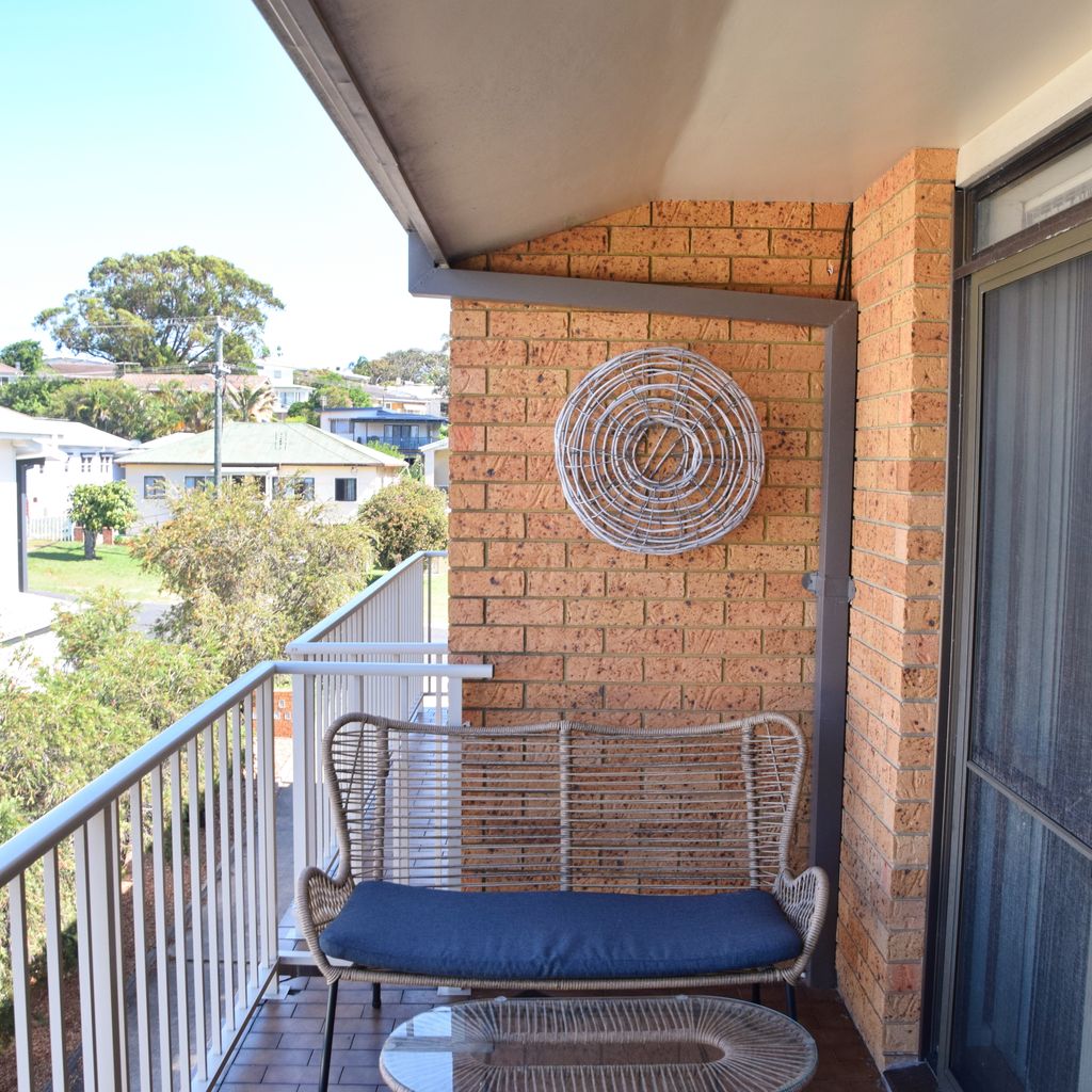 Outdoor seating on the balcony.