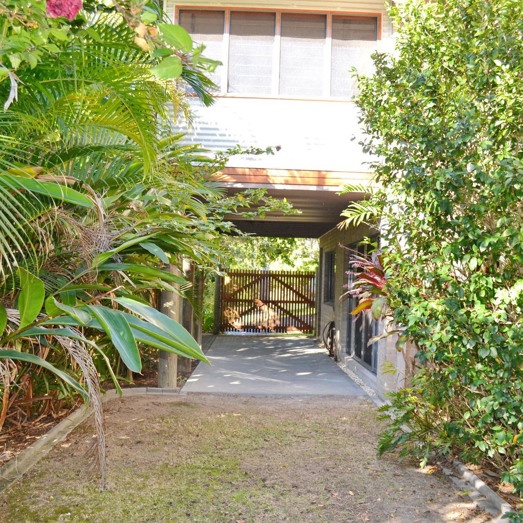 Backyard and carport.
