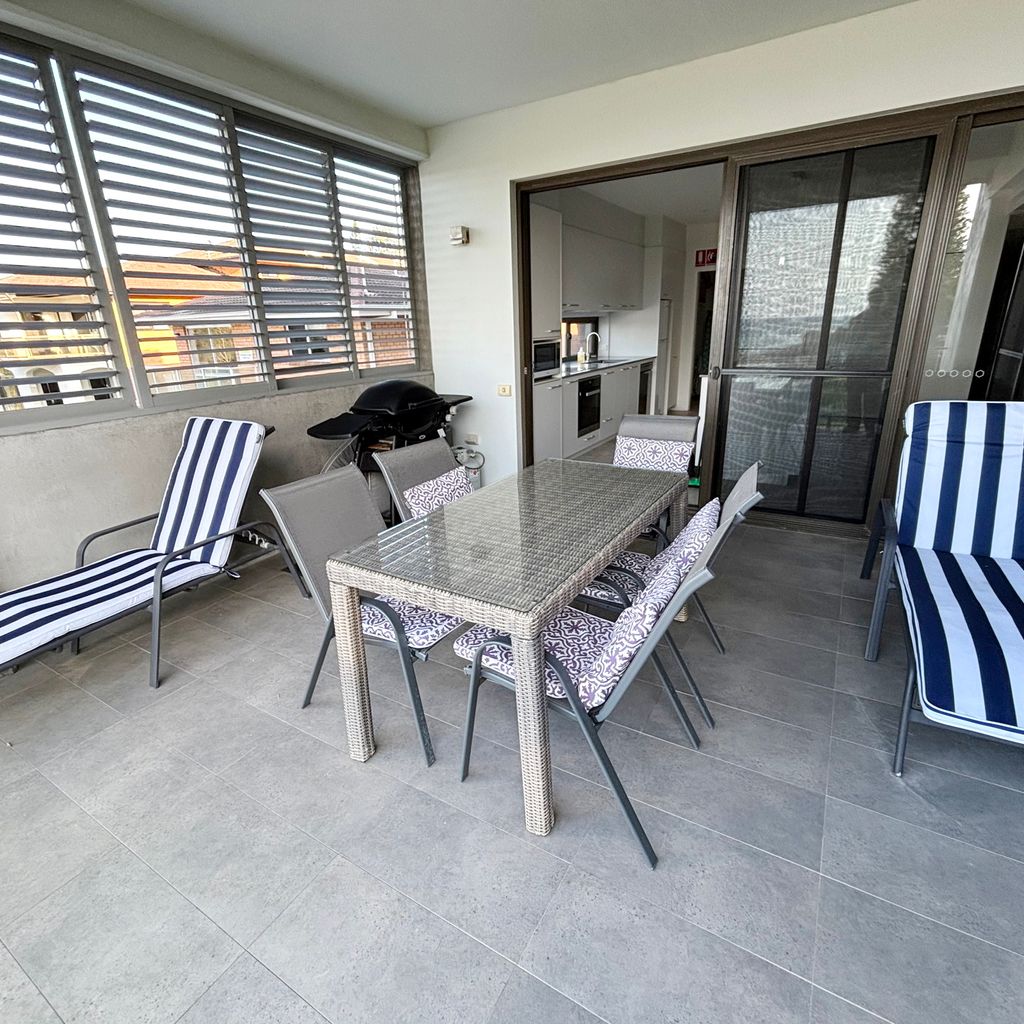 Balcony and outdoor dining area. 