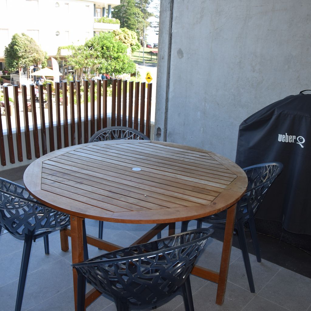 Outdoor dining and BBQ area.