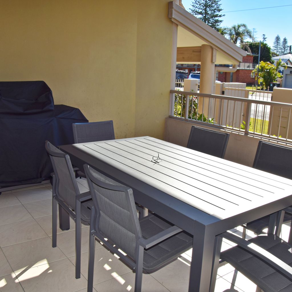 Outdoor dining and BBQ area.