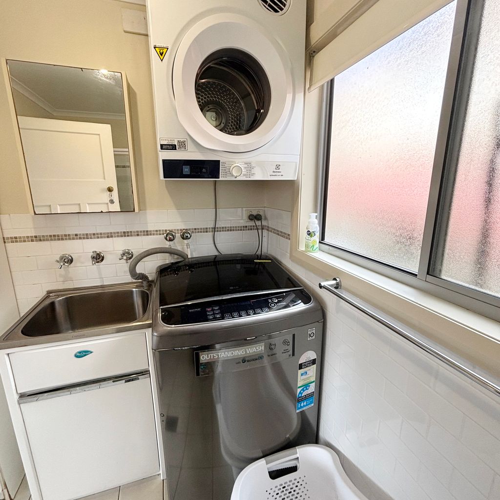 Combined bathroom and laundry. 