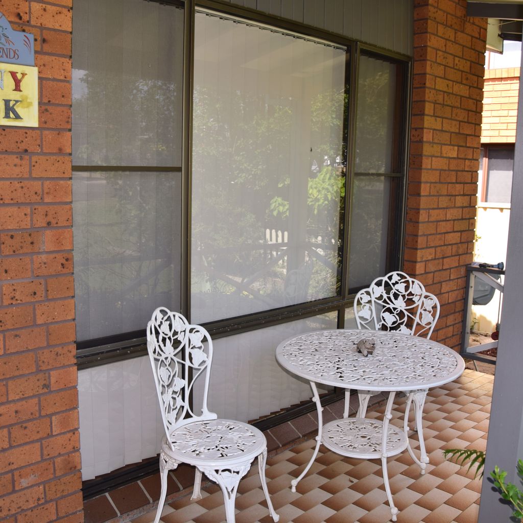 Front porch and sign.