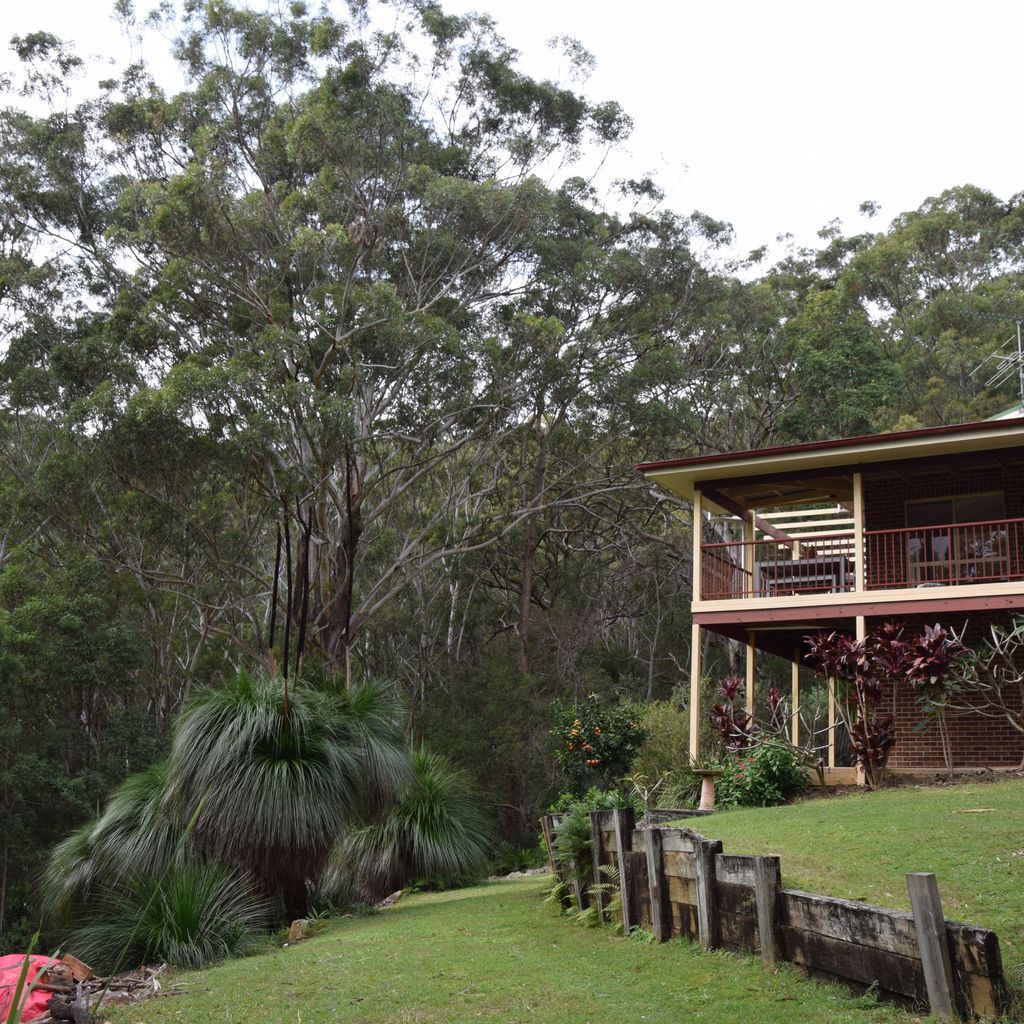 External view of the property and bush.