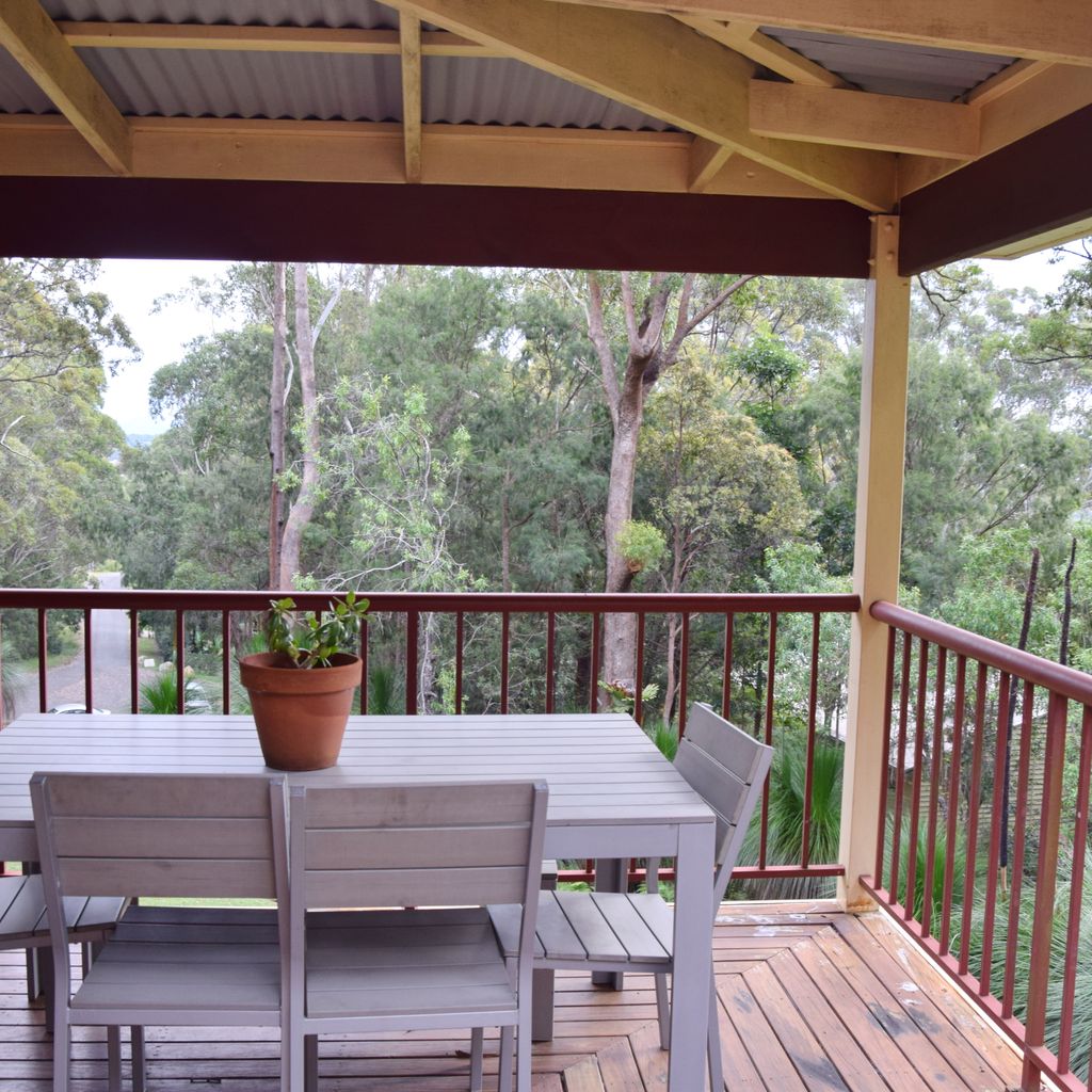 Outdoor dining and bush view.