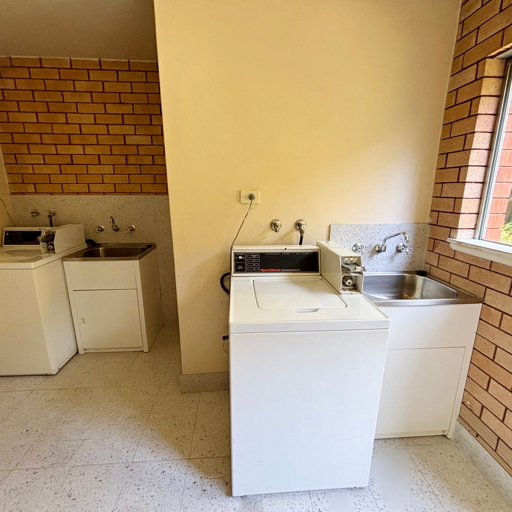 Outdoor shared laundry. 