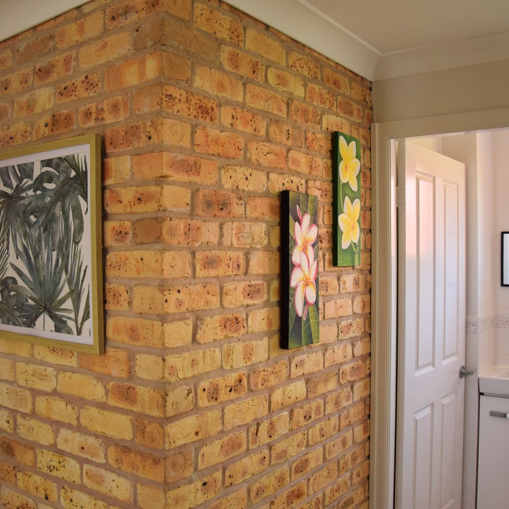 Hallway and separate toilet.