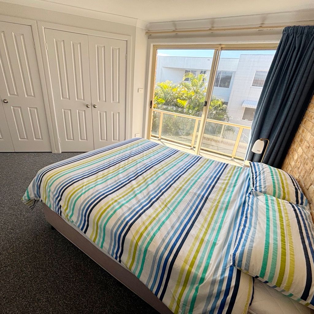 Main bedroom and private balcony. 
