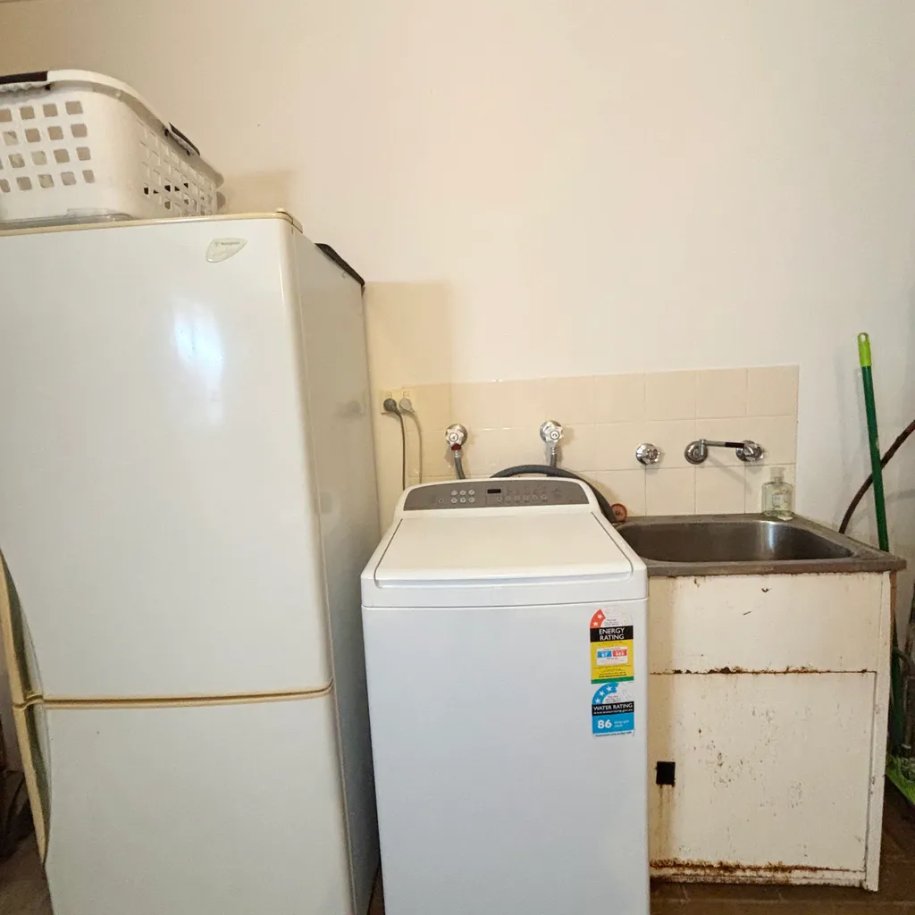 Laundry in garage. 