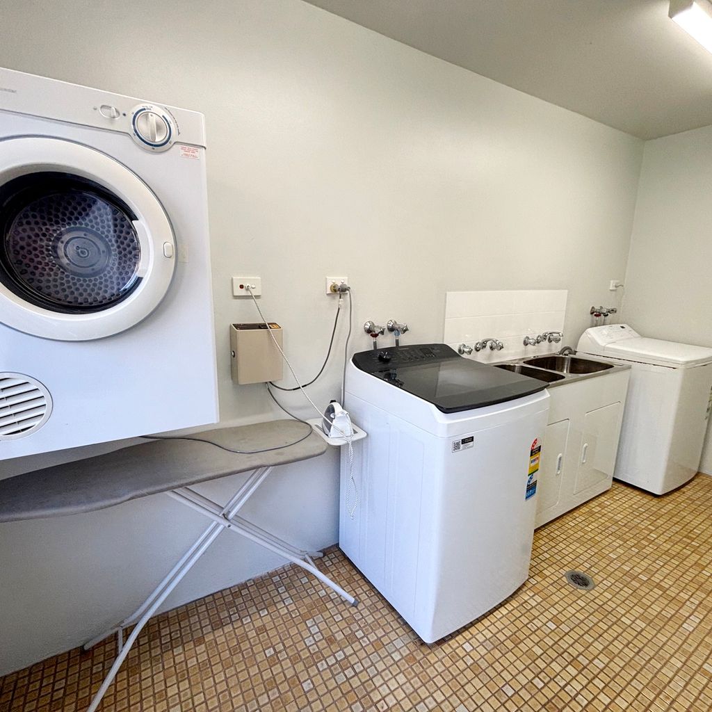 Shared outdoor laundry. 