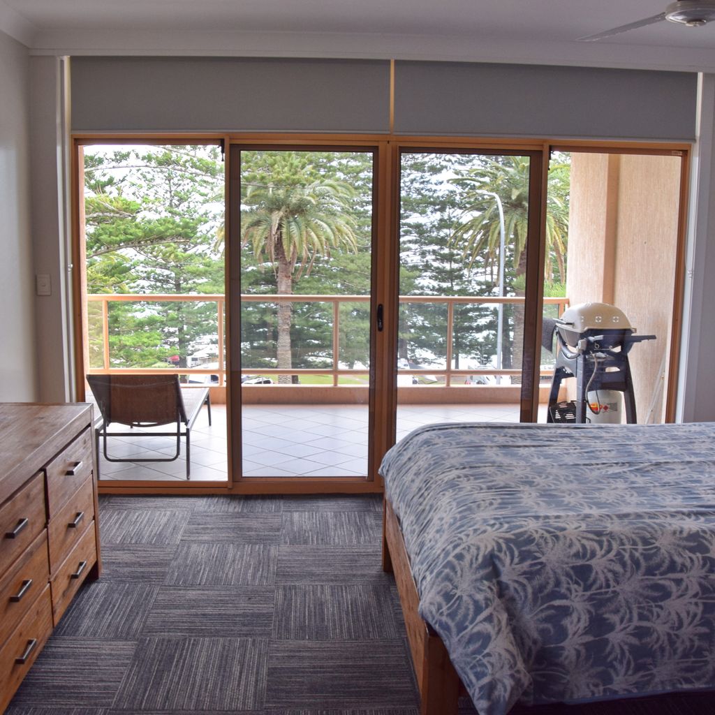 Master bedroom and balcony.