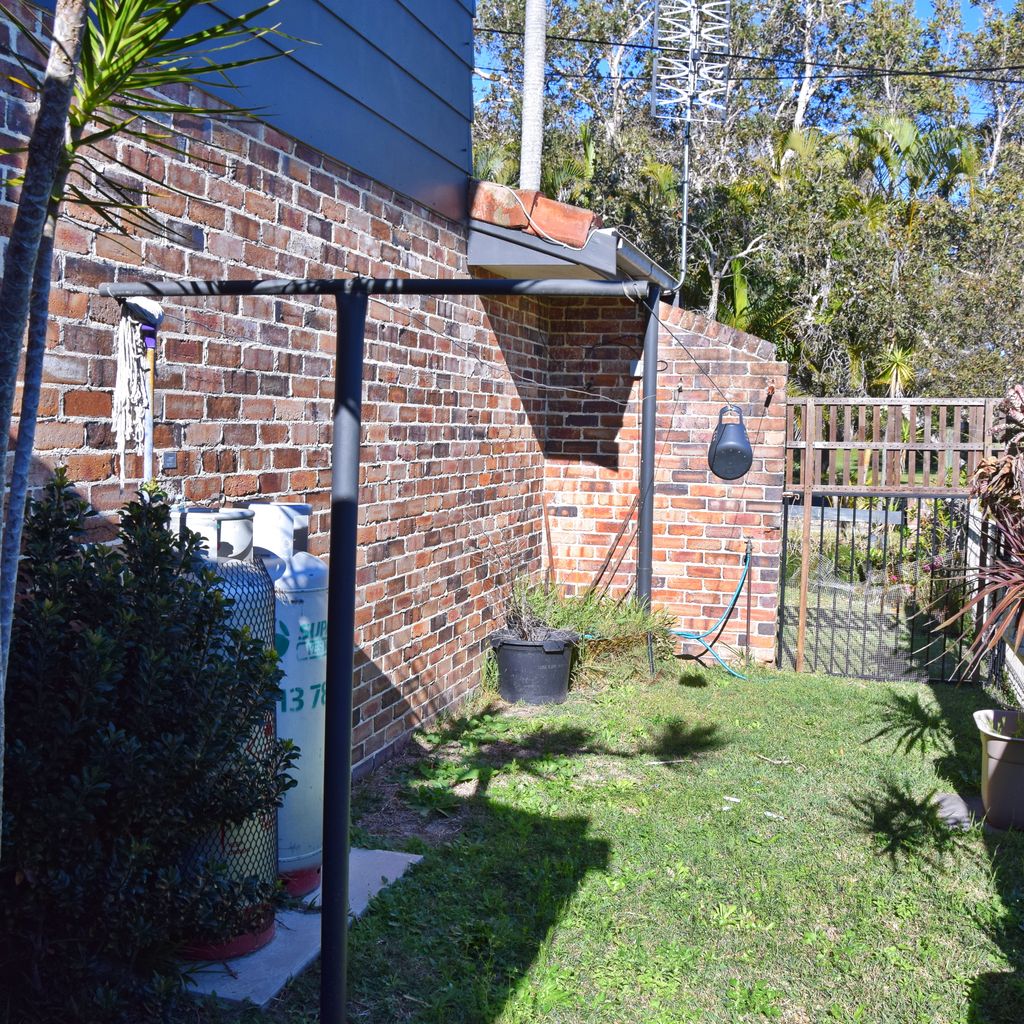 Backyard and clothes line.
