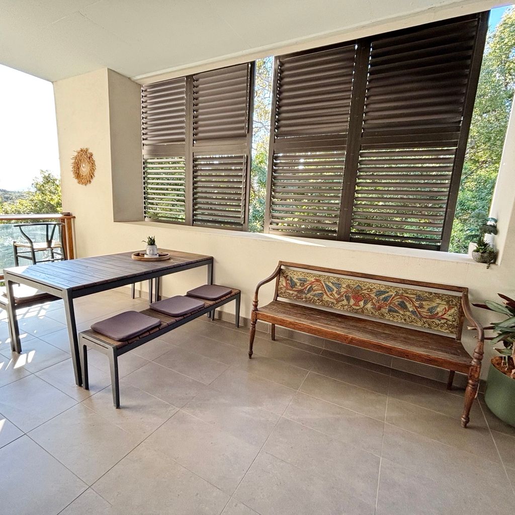Private balcony and outdoor dining area.