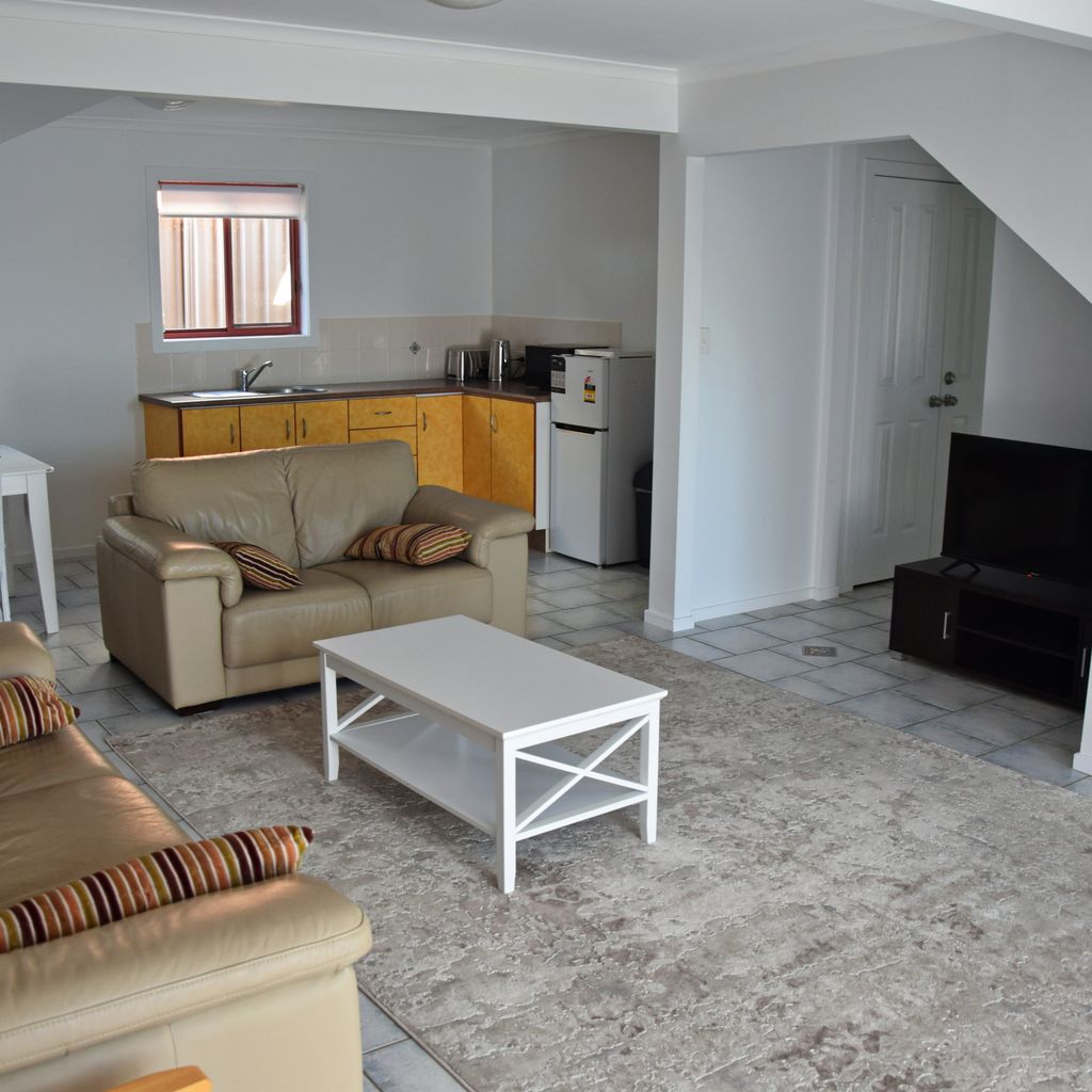 Downstairs living and kitchenet.