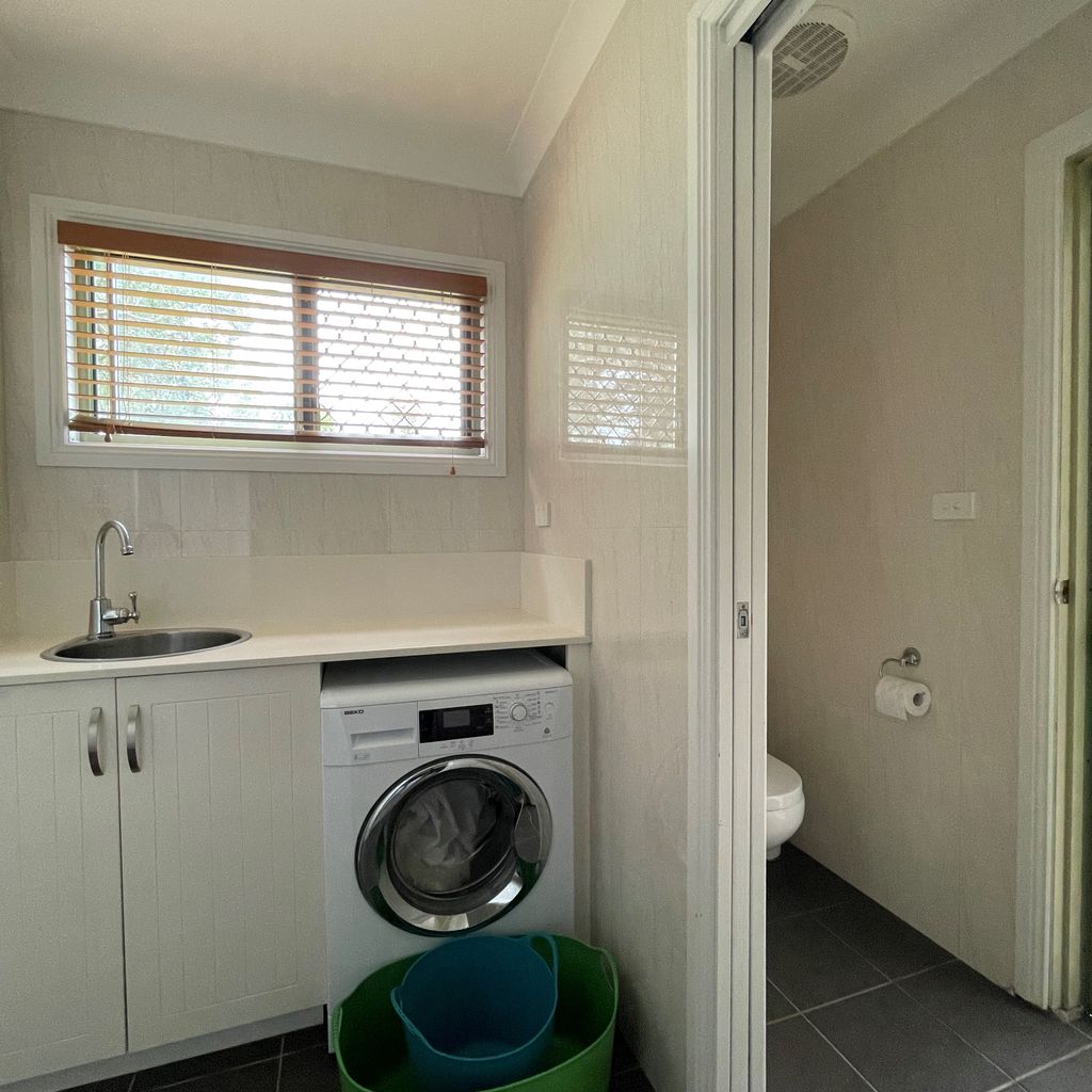 'Sleep-out' laundry/bathroom.