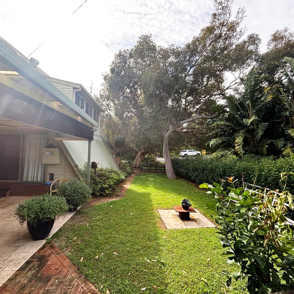 Yard on side of property. 
