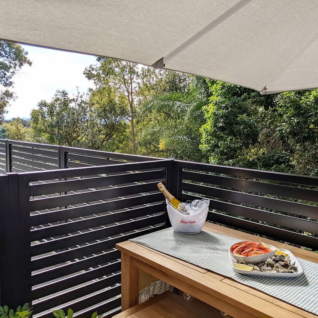 Outdoor dining set, near front gate.