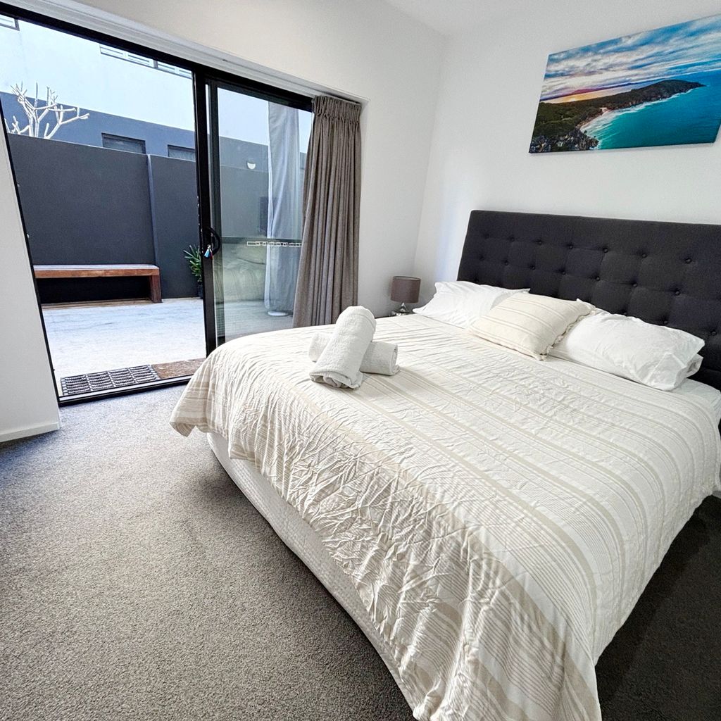 Master bedroom and private courtyard. 