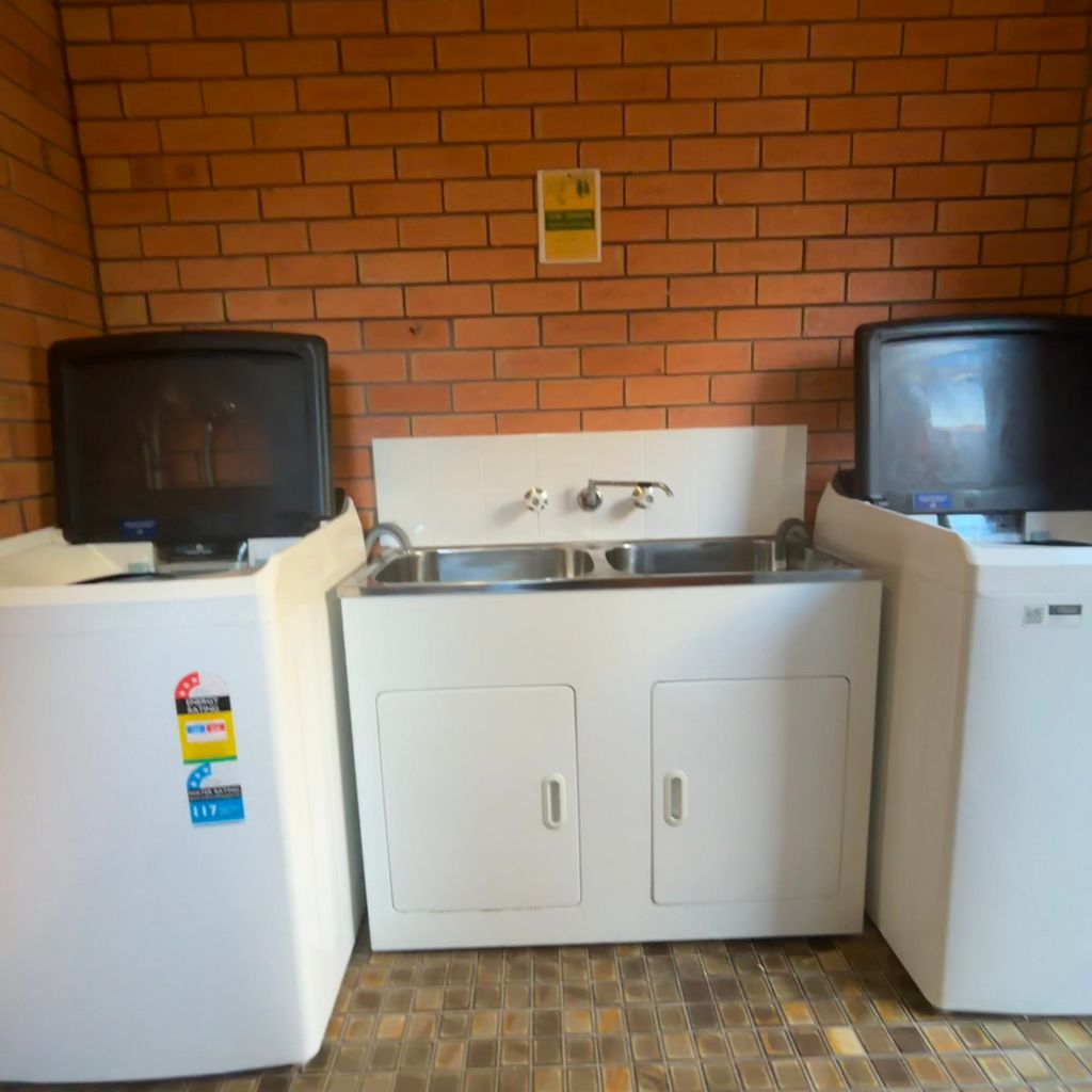 Shared outdoor laundry. 