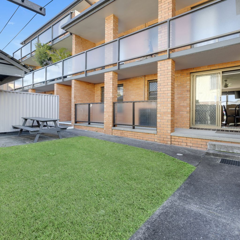 Shared BBQ area and yard.