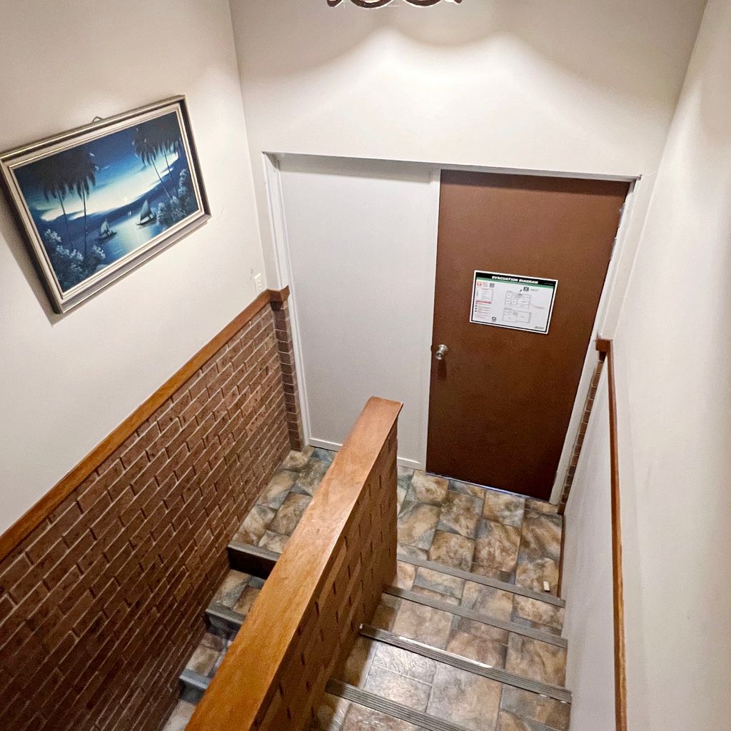 Stairway and front door.