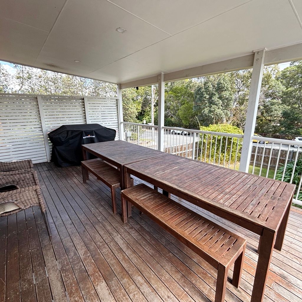 Upstairs outdoor dining and balcony. 