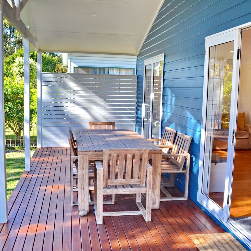 Front porch with outdoor dining set.