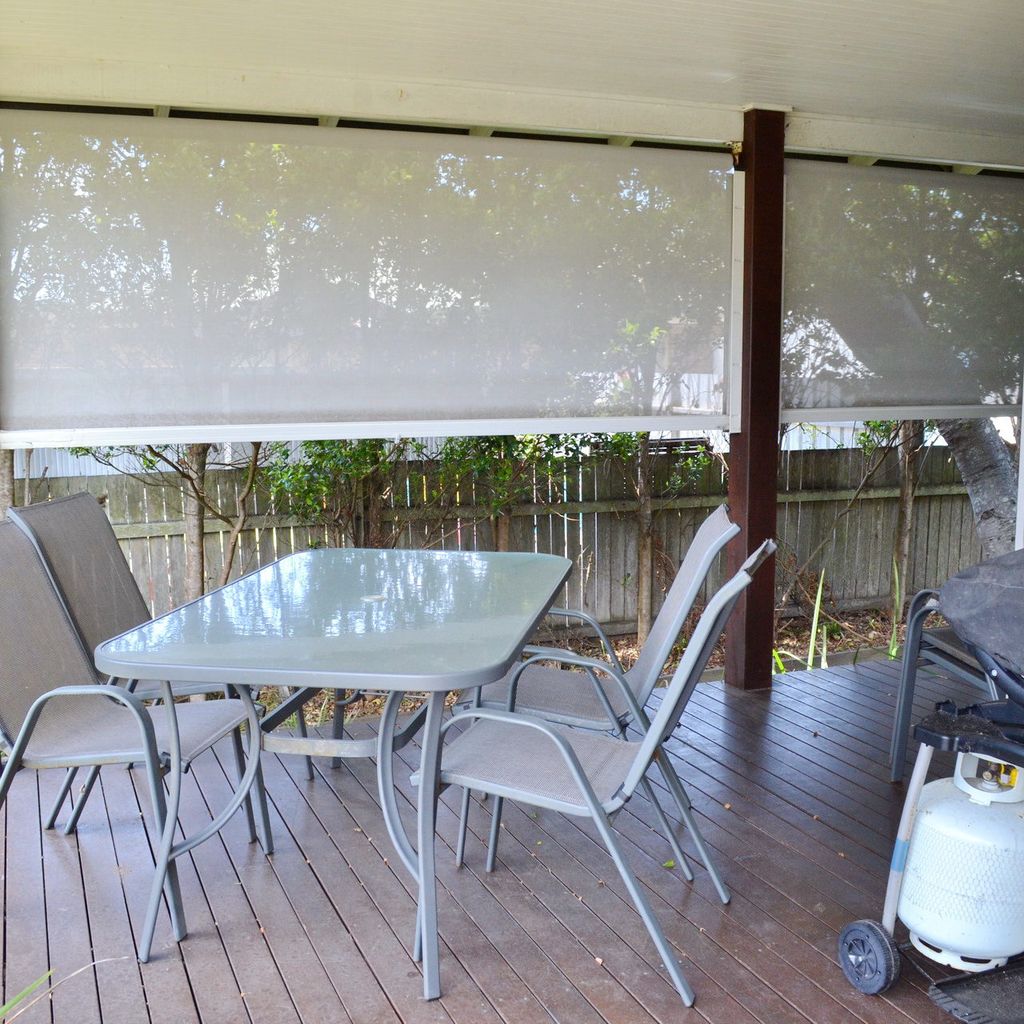 Outdoor dining and BBQ area.