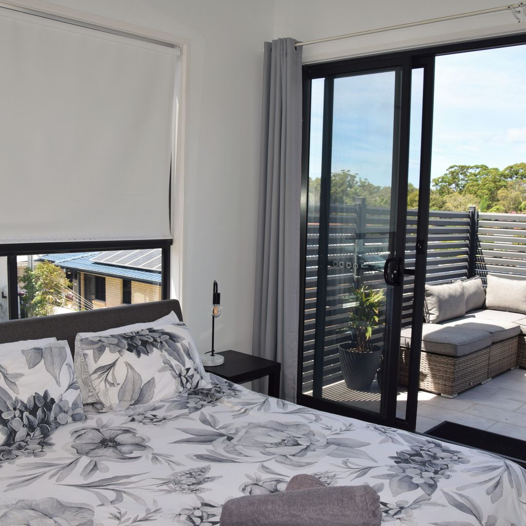 Master bedroom and back balcony.
