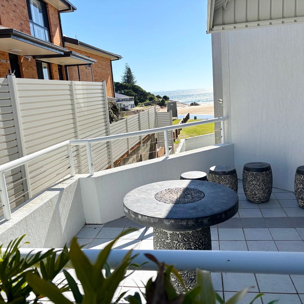 Private side-balcony with ocean views.