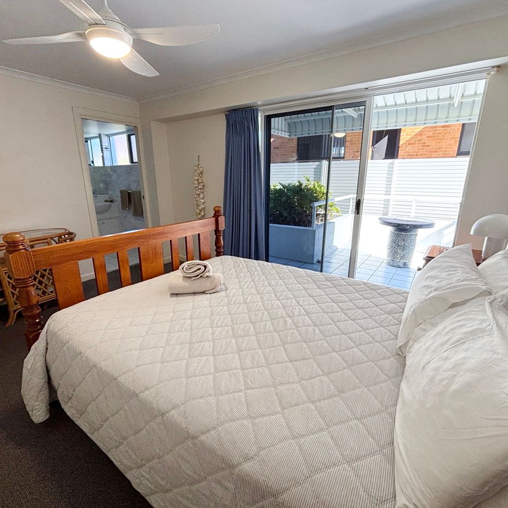 Master bedroom and private side-balcony. 
