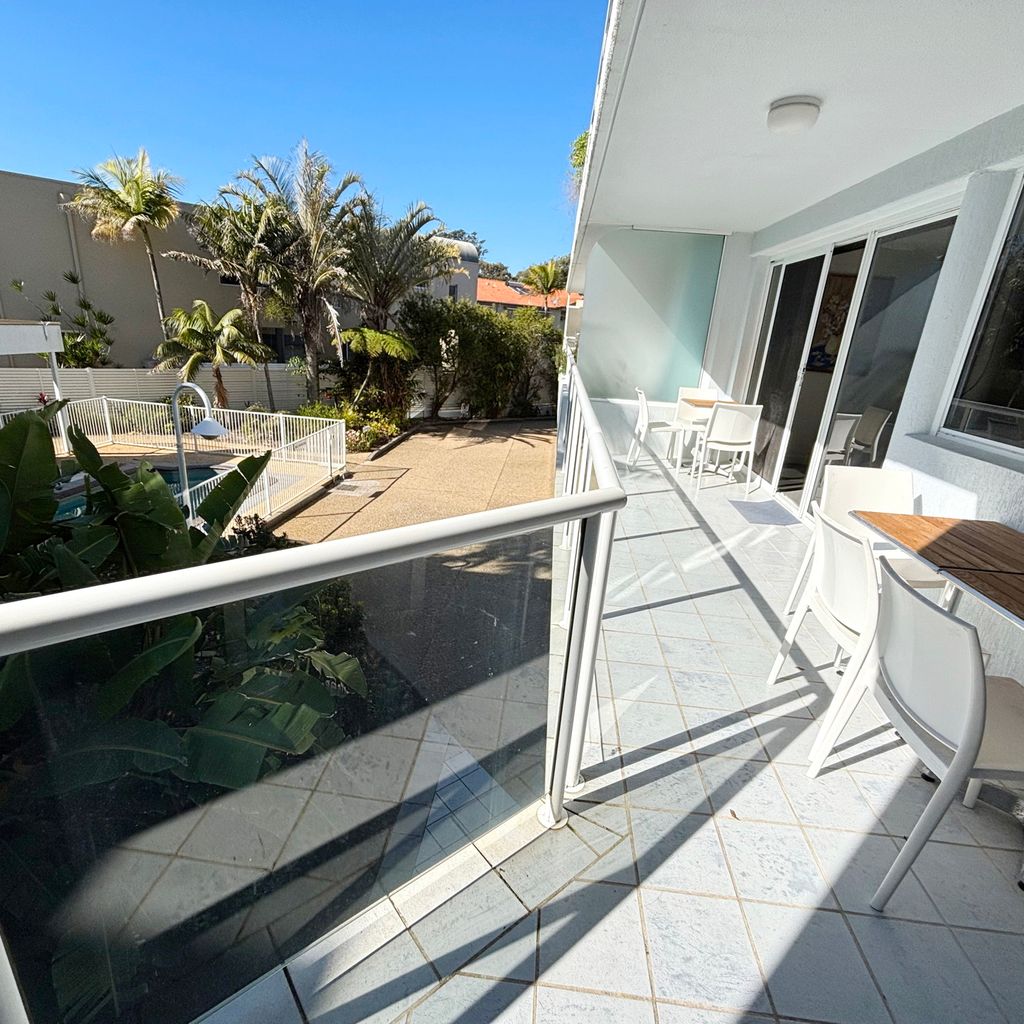 Balcony overlooking the pool.