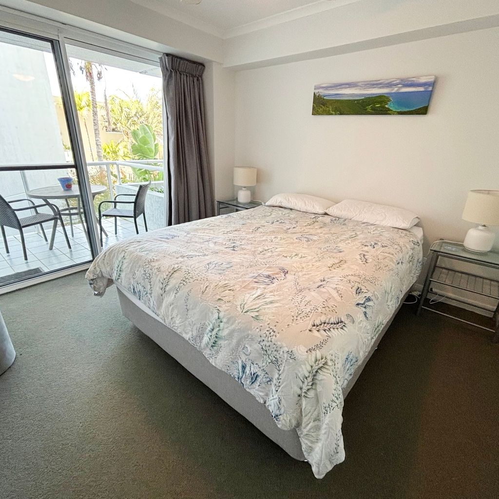 Second bedroom and private balcony. 