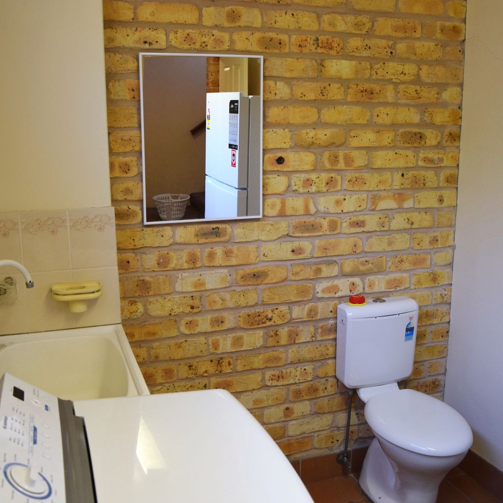 Downstairs laundry/bathroom.
