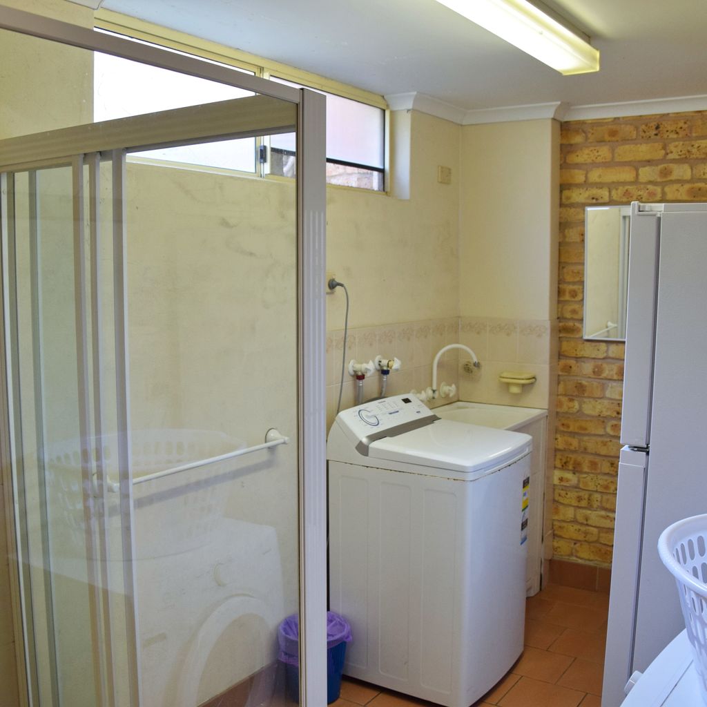 Downstairs laundry/bathroom.