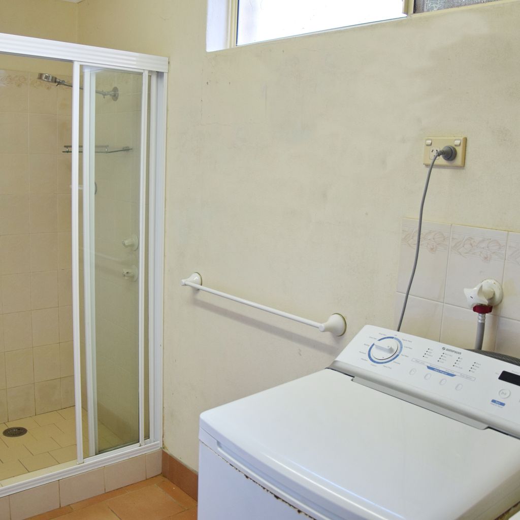 Downstairs laundry/bathroom.