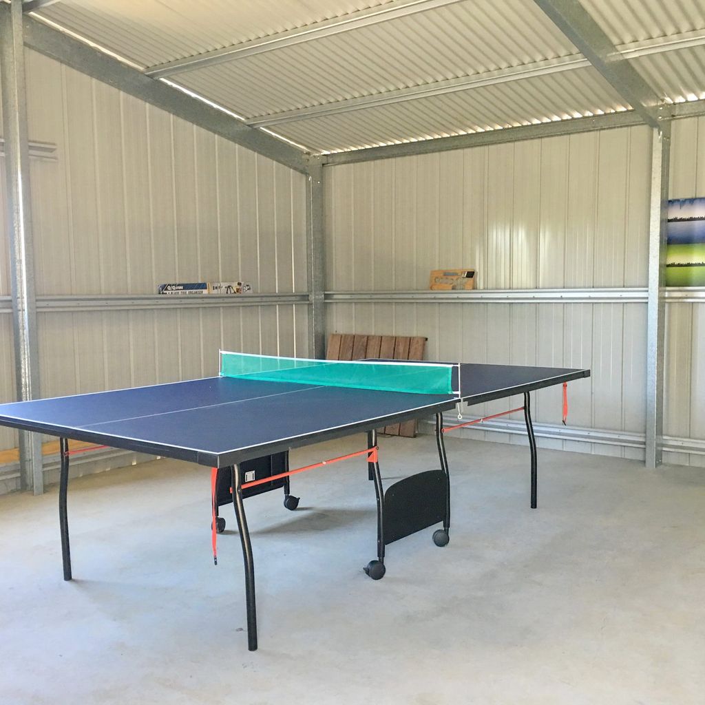 Ping pong table in shed.