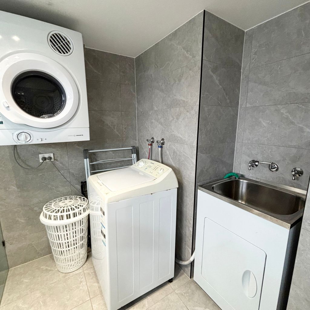 Laundry in bathroom. 