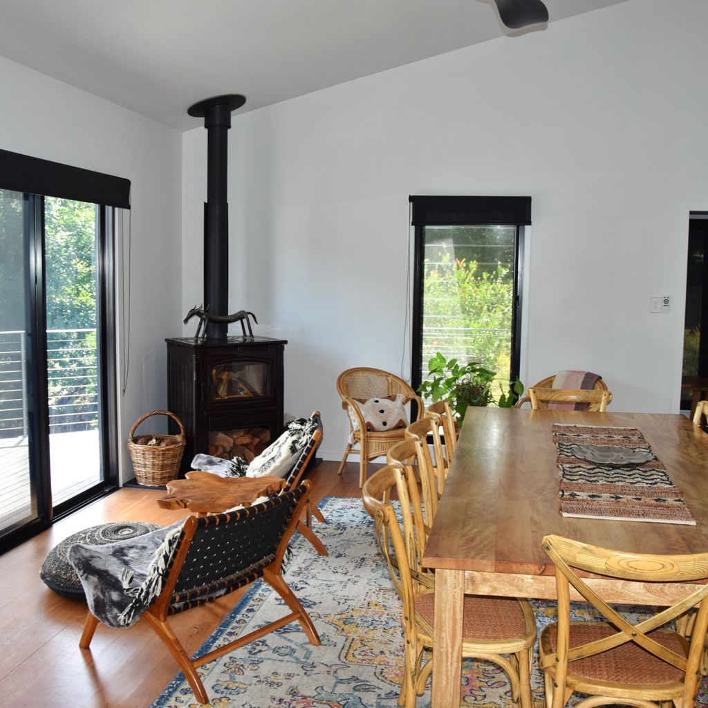Dining and sitting area with fireplace.