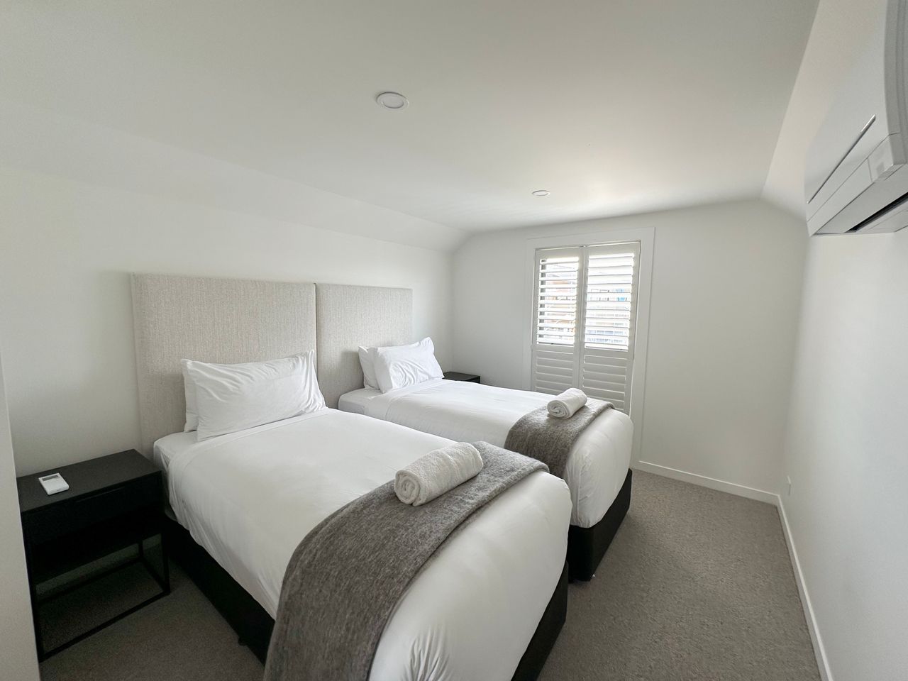 Bedroom 5 - upstairs) can be setup as 2 singles or 1 king (shown here as 2 singles)