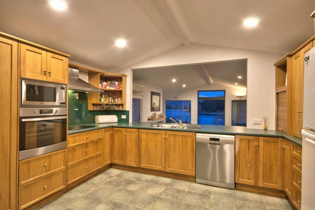 Fully equipped kitchen over-looks the living area
