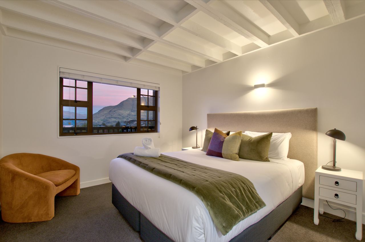 Downstairs master bedroom with views to the lake and mountains (Bedroom 1 - King Bed)