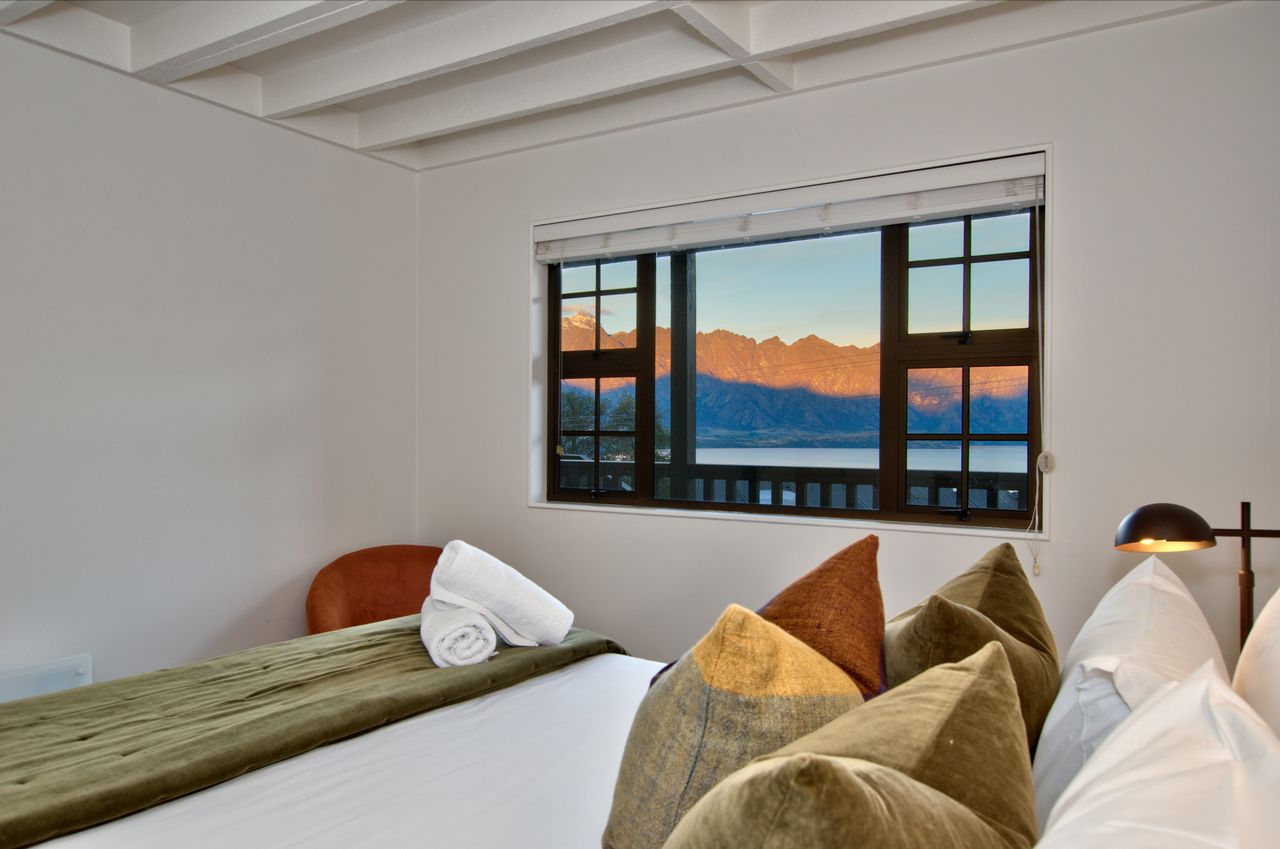 Views of the lake and mountains from downstairs Master Bedroom (Bedroom 1 - King)