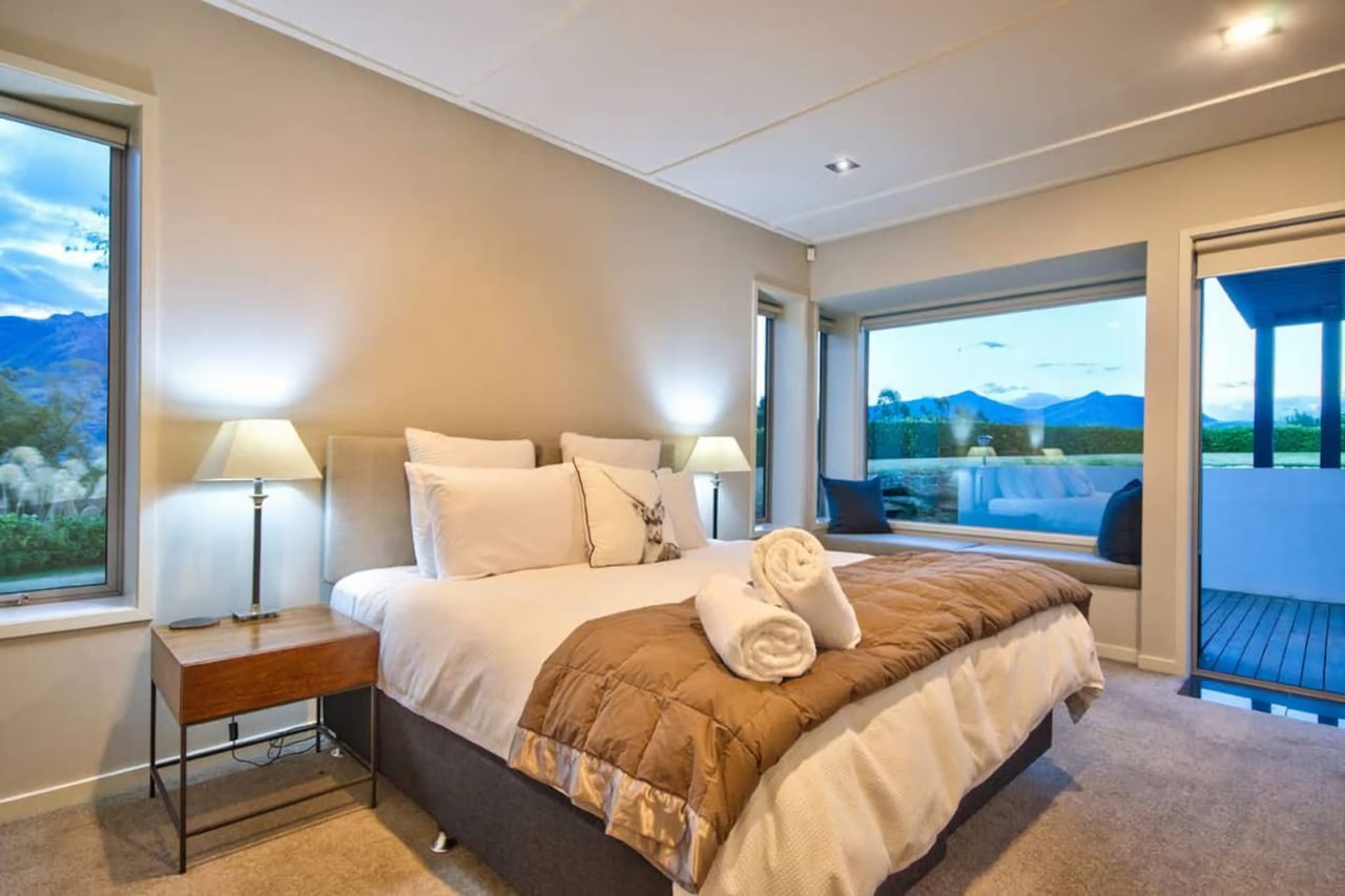 Bedroom 3 - can be 2 singles or 1 King - opens out onto small patio