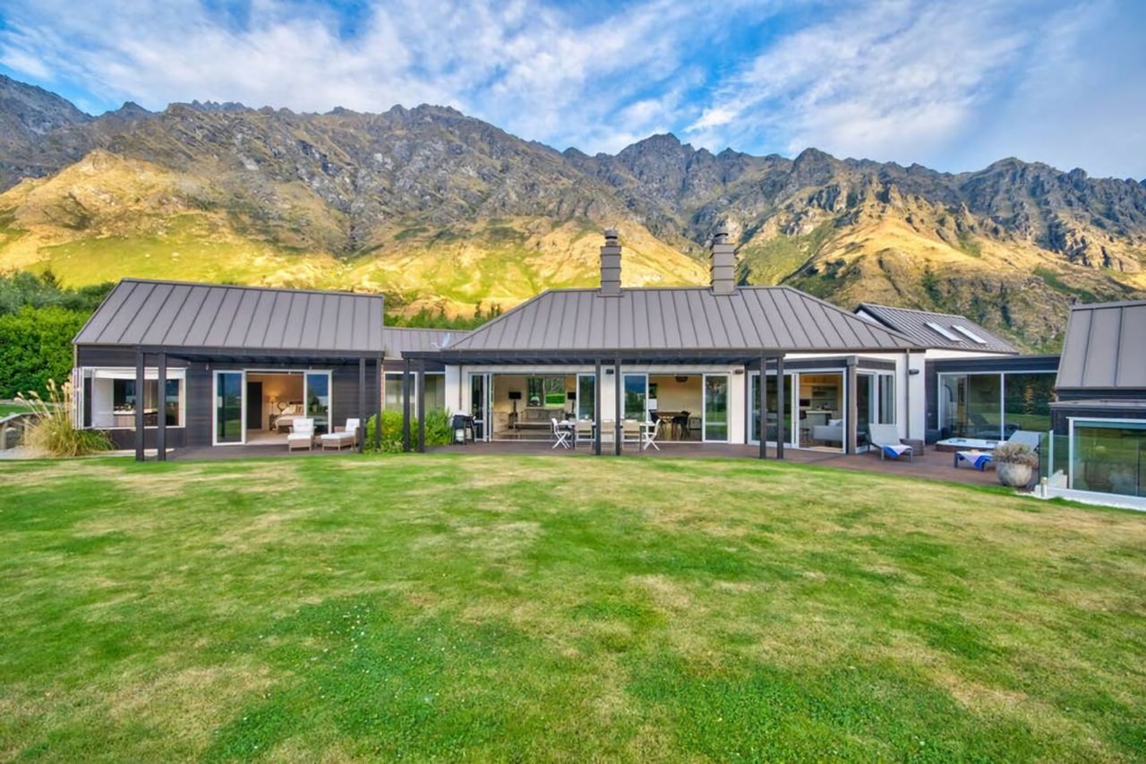 Part view of the house (Master Bedroom on left, lounge dining in the middle, outdoor spa on right. Beds 2 & 3 & cannot be seen