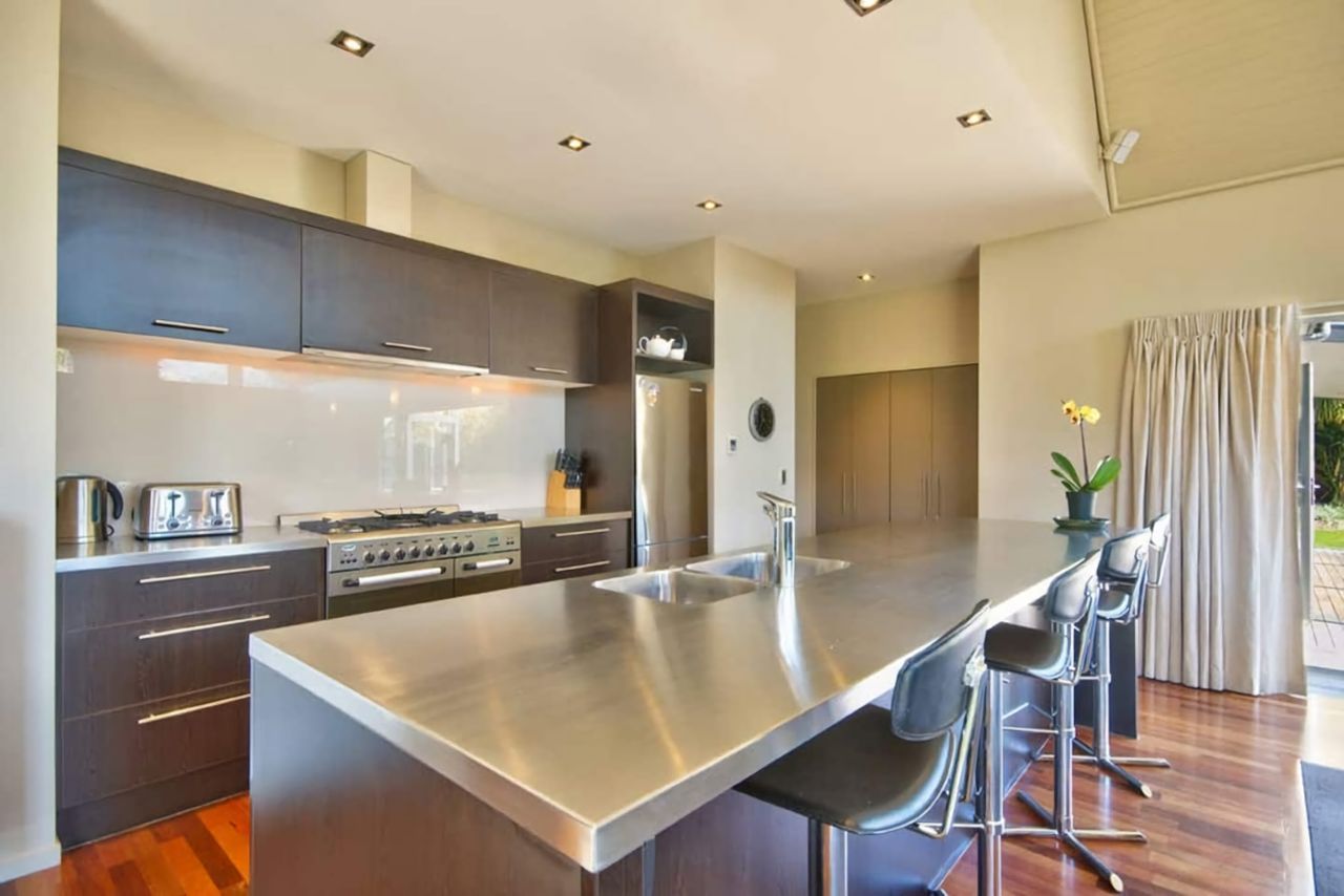 Fully Equipped Kitchen with island bench (note: bar stills have been upgraded)