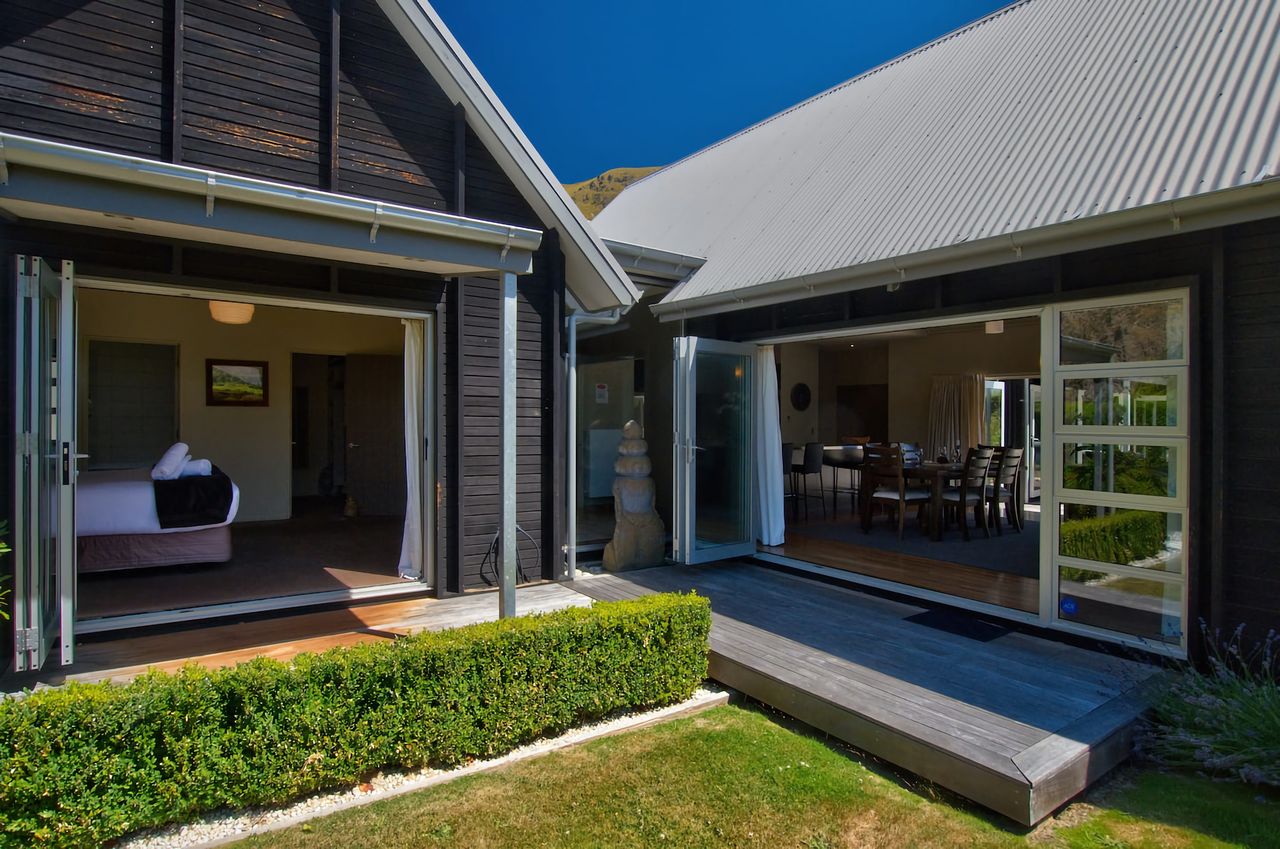 Looking from lawn into Master bedroom & lounge areas