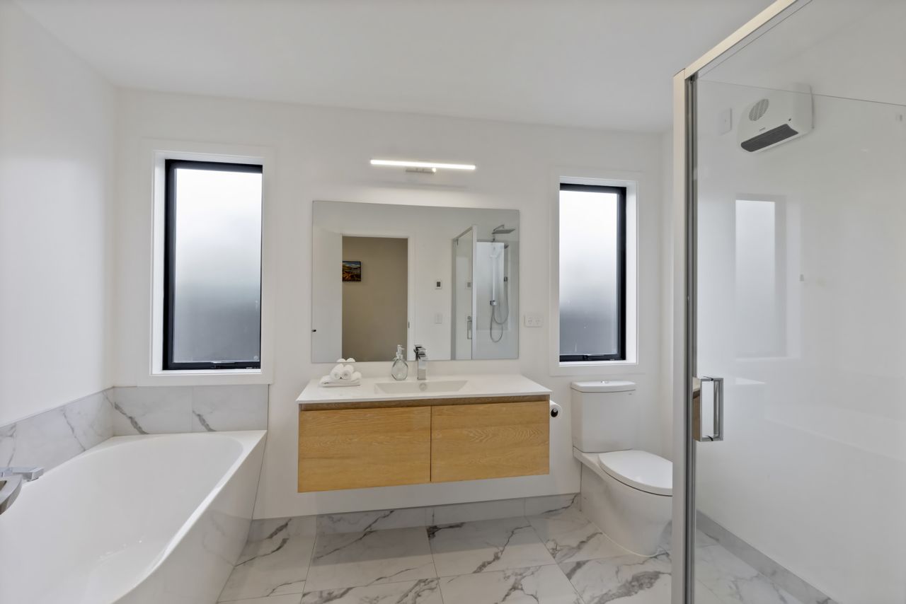 Large family bathroom with separate shower and soak tub