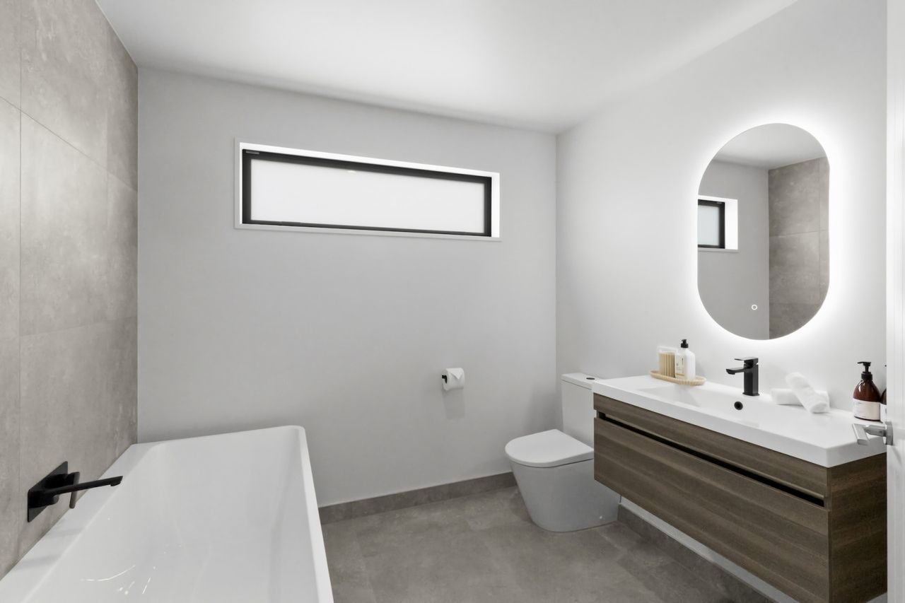 Family bathroom with bath