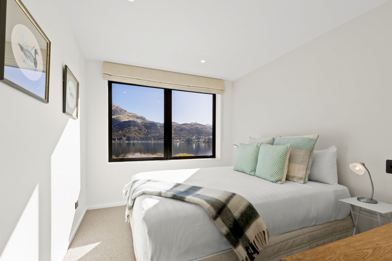 Bedroom 3 with lake and mountain views